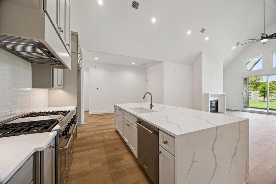 View of the Kitchen, Dining, and Living.