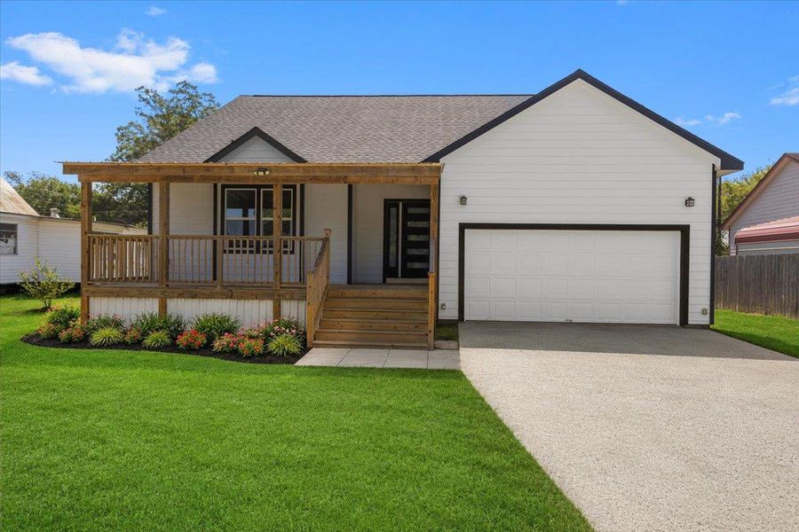 Virtually Landscaped. A spacious covered front porch complements the tidy architecture and attached garage. Virtually Landscaped. A spacious covered front porch complements the tidy architecture and attached garage.