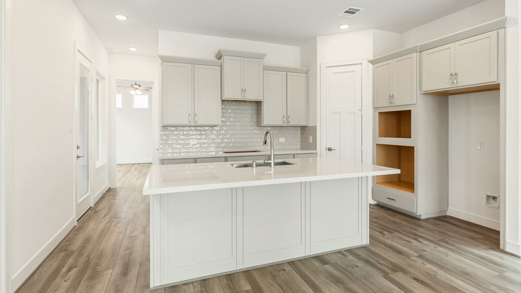 Representative furnished interior of a home built from the Valencia by Brightland Homes in Bridgeland Central, Cypress (Image 8).