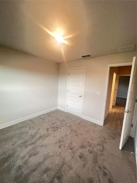 Spacious, unfurnished interior of a new home in Abbey Glen, Dade City (Image 17).