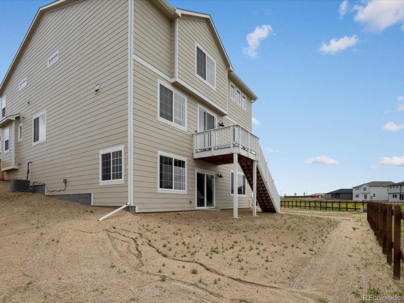 Exterior details and patio area of a home in Buffalo Highlands: The Canyon Collection, Commerce City (Image 2). Exterior details and patio area of a home in Buffalo Highlands: The Canyon Collection, Commerce City (Image 2).