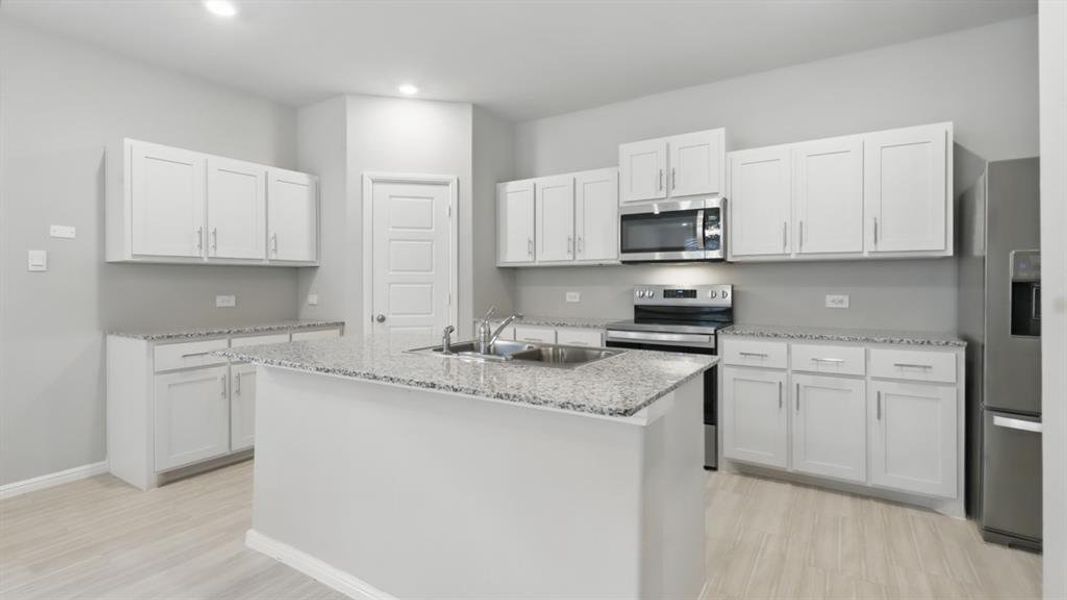 Kitchen - All Home and community information, including pricing, included features, terms, availability and amenities, are subject to change at any time without notice or obligation. All Drawings, pictures, photographs, video, square footages, floor plans, elevations, features, colors and sizes are approximate for illustration purposes only and will vary from the homes as built.