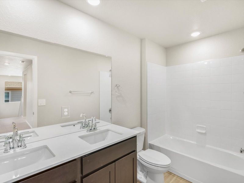 Furnished interior view inside a new home in Lorson Ranch : The Springs Collection, Colorado Springs (Image 6).