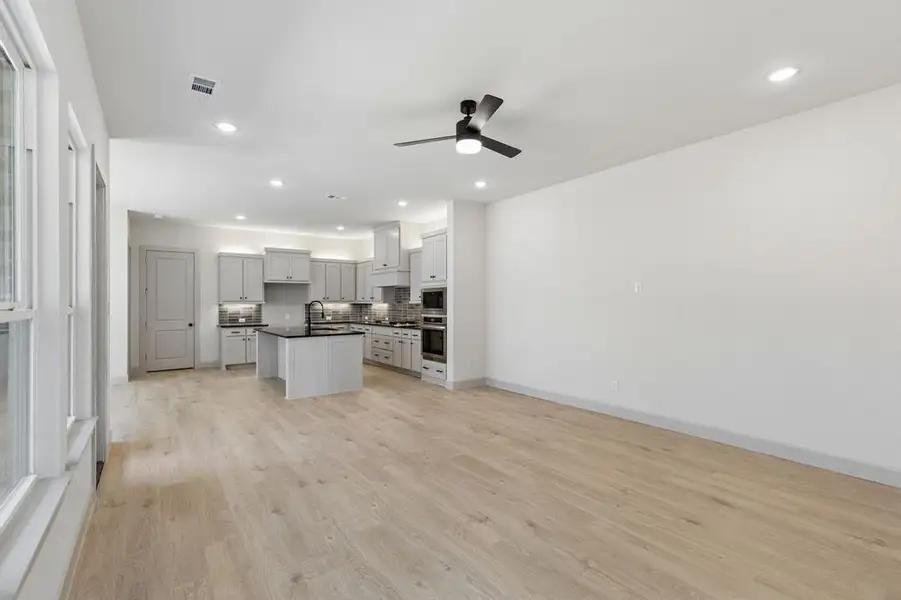 This light and bright open concept floor plan begs for the entertaining to begin! This light and bright open concept floor plan begs for the entertaining to begin!