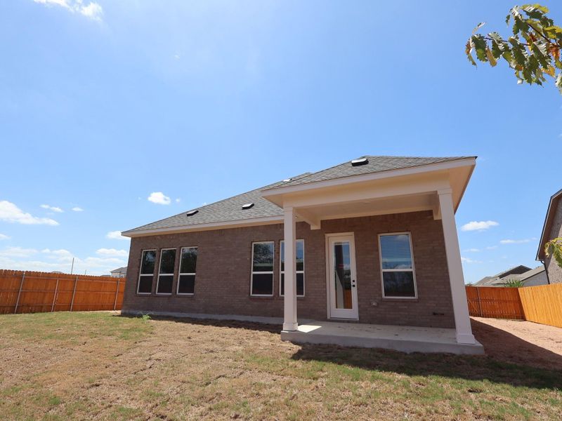 Exterior details and patio area of a home in Colony at Cole Springs, Buda (Image 2). Exterior details and patio area of a home in Colony at Cole Springs, Buda (Image 2).