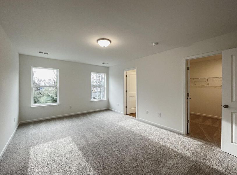 Spacious, unfurnished interior of a new home in East Main Townes, Spartanburg (Image 21).