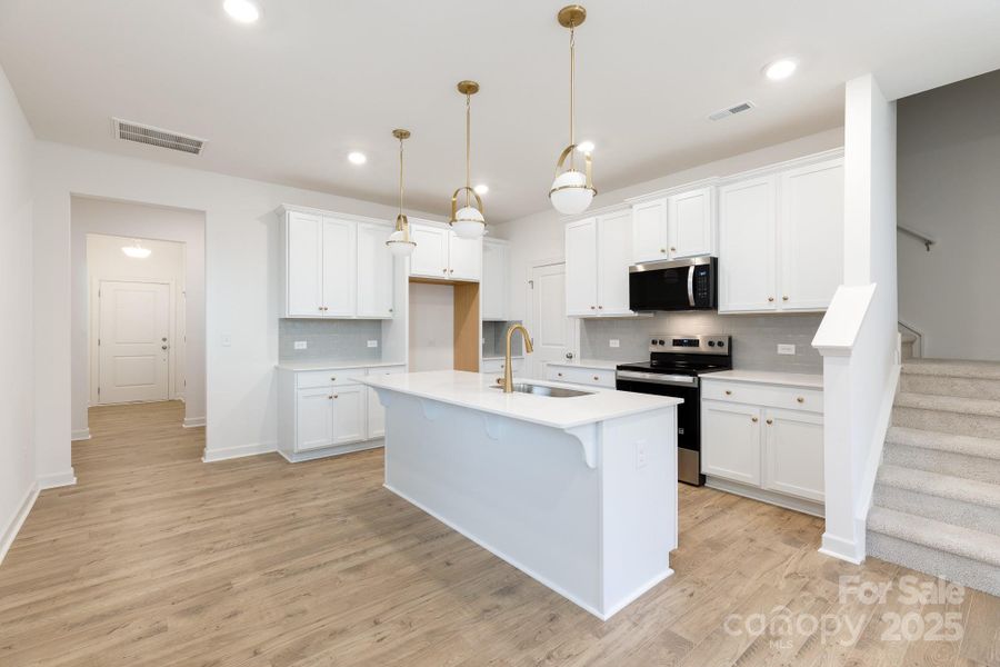 Furnished interior view inside a new home in , Charlotte (Image 11).