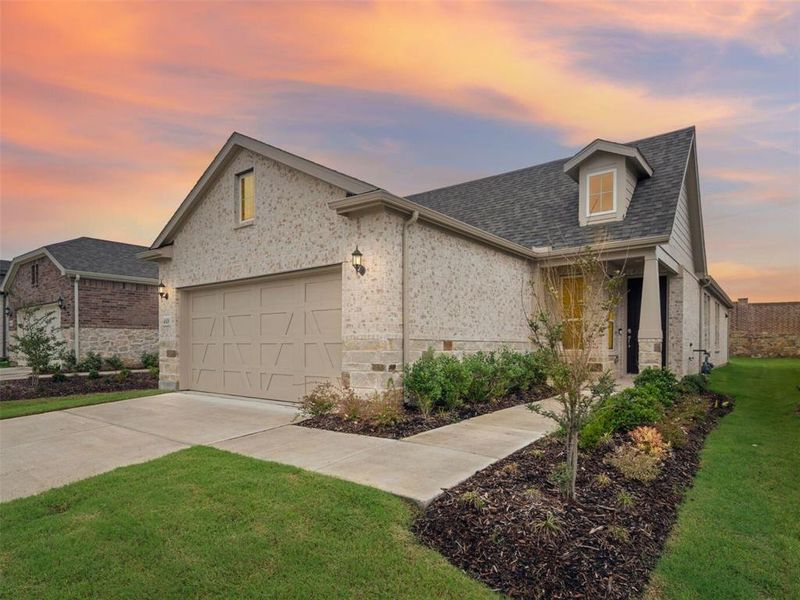 Front exterior of a new home in Del Webb at Legacy Hills, Celina, TX, highlighting curb appeal (Image 2). Front exterior of a new home in Del Webb at Legacy Hills, Celina, TX, highlighting curb appeal (Image 2).