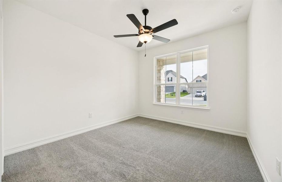 Comfortable bedroom with a bright window view