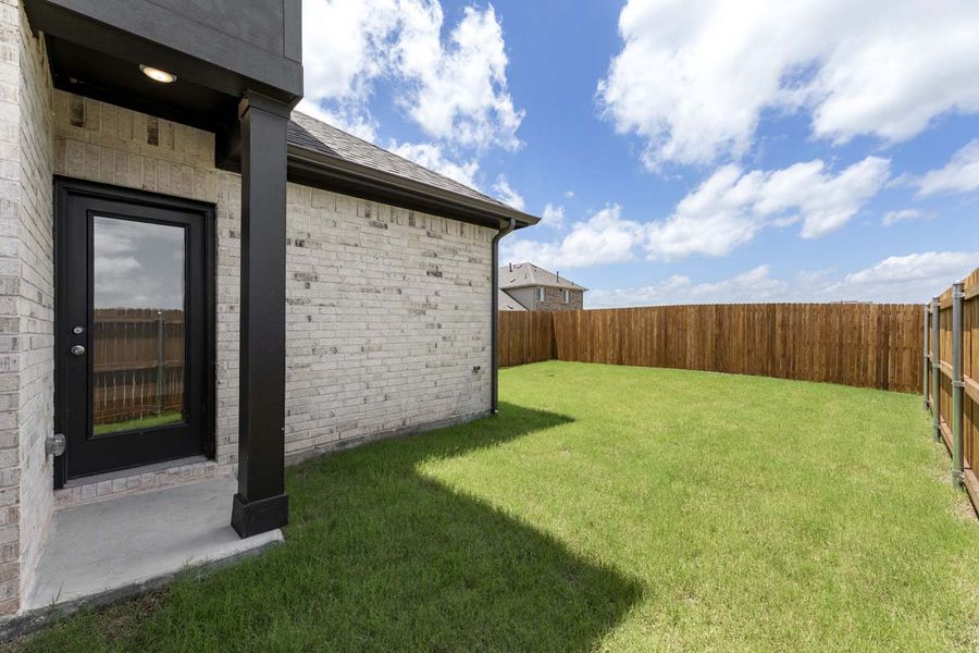 Exterior details and patio area of a home in Elevon, Lavon (Image 3).