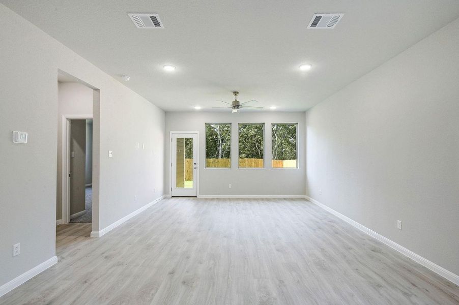 Living Room in the Willow home plan by Trophy Signature Homes – REPRESENTATIVE PHOTO