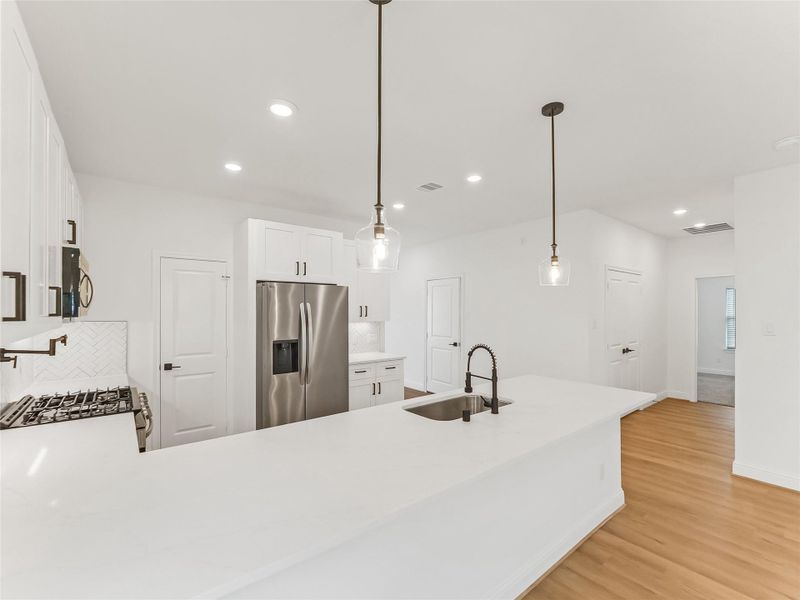 Furnished interior view inside a new home in Hill & Dale Ranch, Splendora (Image 8).