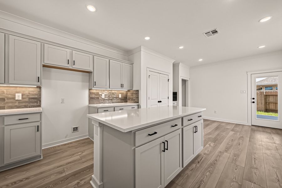 Furnished interior view inside a new home in Aldeana, Bonney (Image 11).