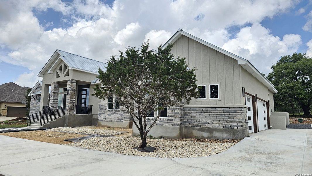 Front exterior of a new home in , New Braunfels, TX, highlighting curb appeal (Image 31).