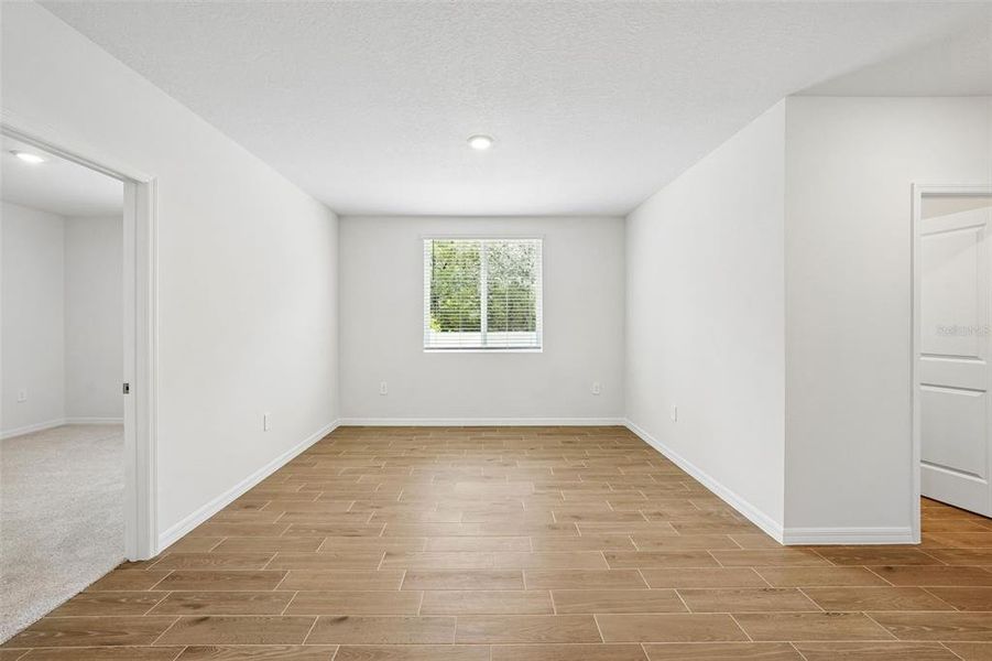 Spacious, unfurnished interior of a new home in Pine Ridge Meadows, Hudson (Image 22).