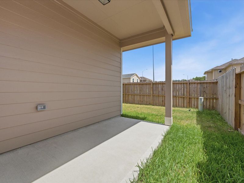Enjoy outdoor living with a covered back patio that extends your living space and creates the perfect setting for relaxing or entertaining. Enjoy outdoor living with a covered back patio that extends your living space and creates the perfect setting for relaxing or entertaining.