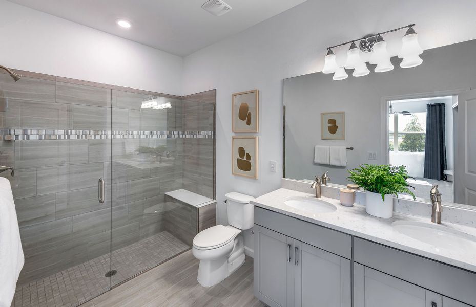 Representative furnished interior of a home built from the Cascadia by DiVosta in BeachWalk by Manasota Key, Englewood (Image 35).