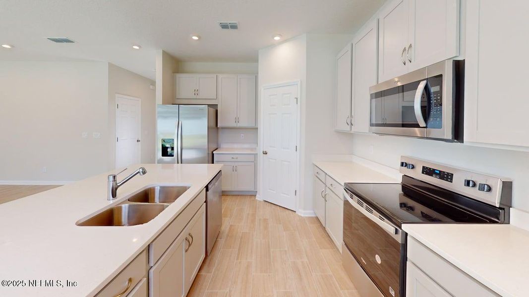 Furnished interior view inside a new home in Sandridge Hills, Green Cove Springs (Image 5). Furnished interior view inside a new home in Sandridge Hills, Green Cove Springs (Image 5).