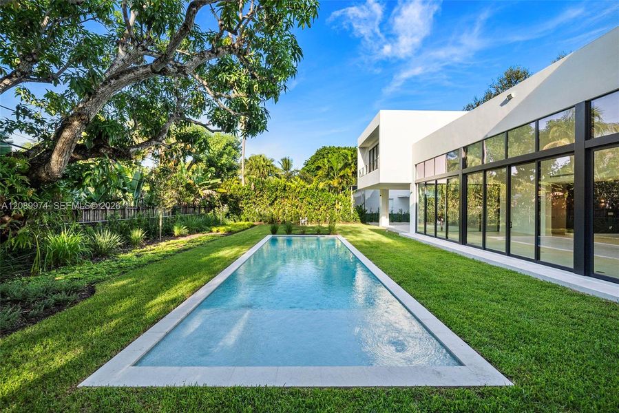 Exterior details and patio area of a home in , South Miami (Image 31).