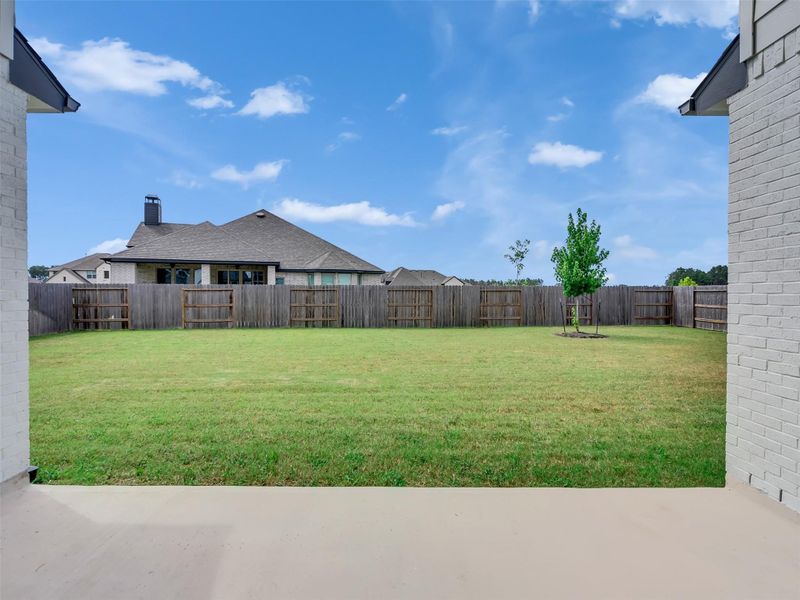 Exterior details and patio area of a home in ARTAVIA®, Conroe (Image 2). Exterior details and patio area of a home in ARTAVIA®, Conroe (Image 2).