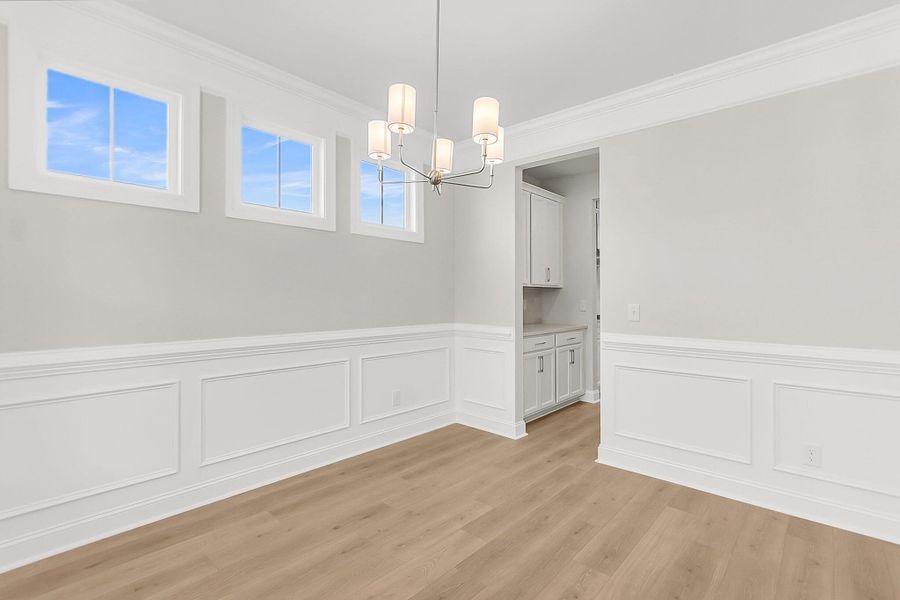 Spacious, unfurnished interior of a new home in Tidewater at Lakes of Cane Bay, Summerville (Image 32).