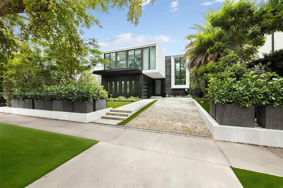 Front exterior of a new home in , Miami Beach, FL, highlighting curb appeal (Image 29). Front exterior of a new home in , Miami Beach, FL, highlighting curb appeal (Image 29).
