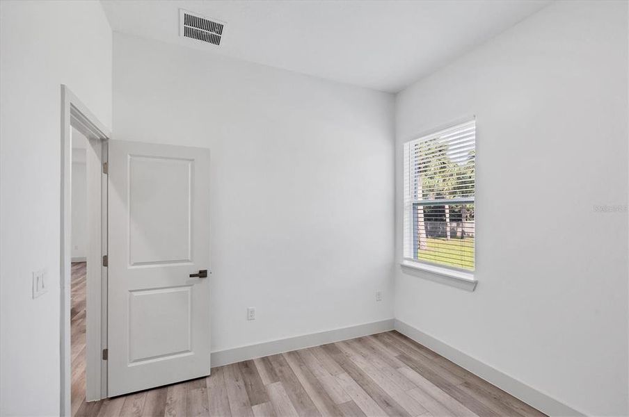 Spacious, unfurnished interior of a new home in , Port Charlotte (Image 17).