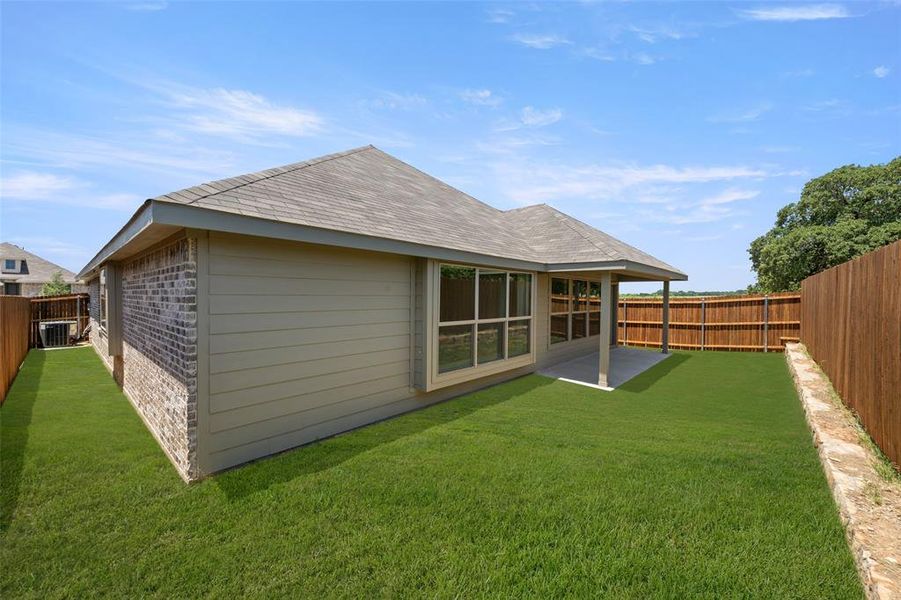 Front exterior of a new home in Pirate Village, Granbury, TX, highlighting curb appeal (Image 17). Front exterior of a new home in Pirate Village, Granbury, TX, highlighting curb appeal (Image 17).