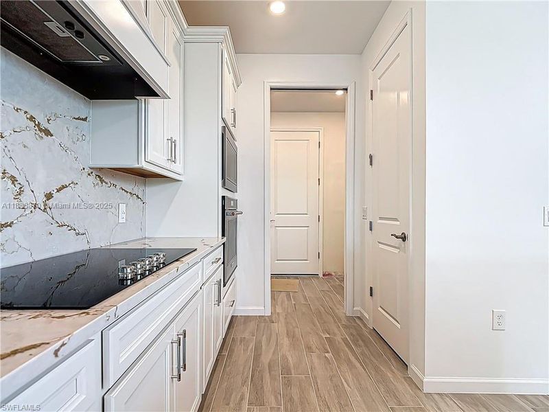 Furnished interior view inside a new home in , Ave Maria (Image 4).