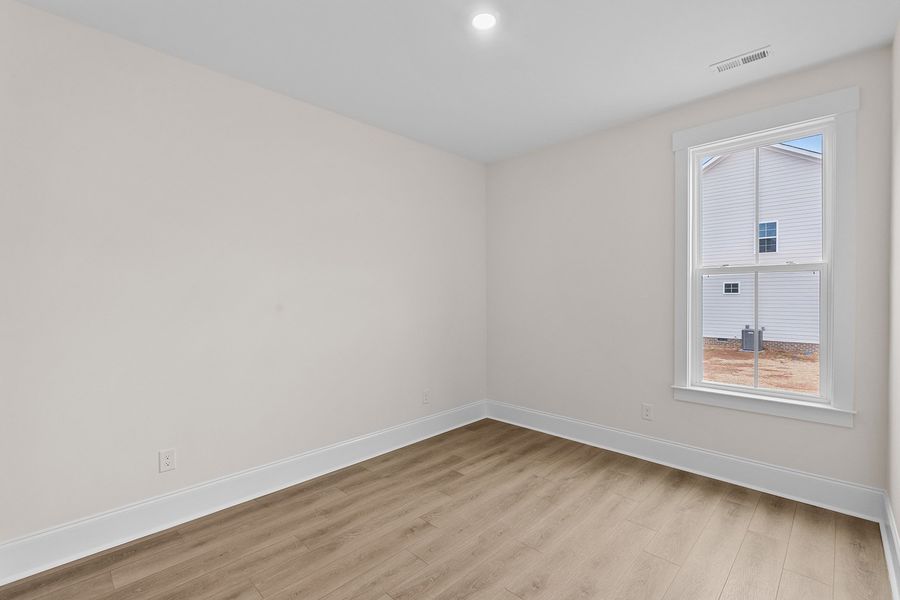 Spacious, unfurnished interior of a new home in Lilah Grove, Summerfield (Image 41).