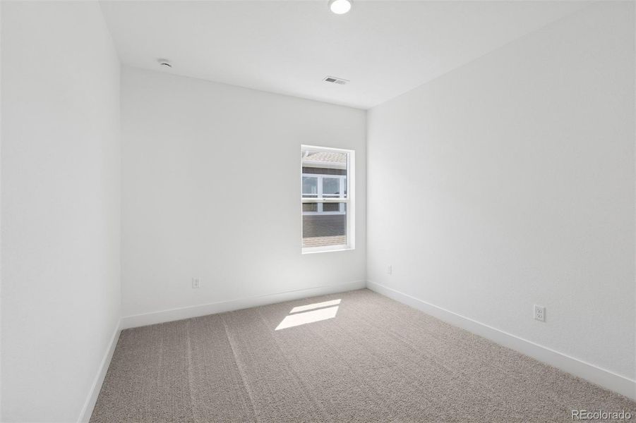 Spacious, unfurnished interior of a new home in Painted Prairie Cottage, Aurora (Image 23).