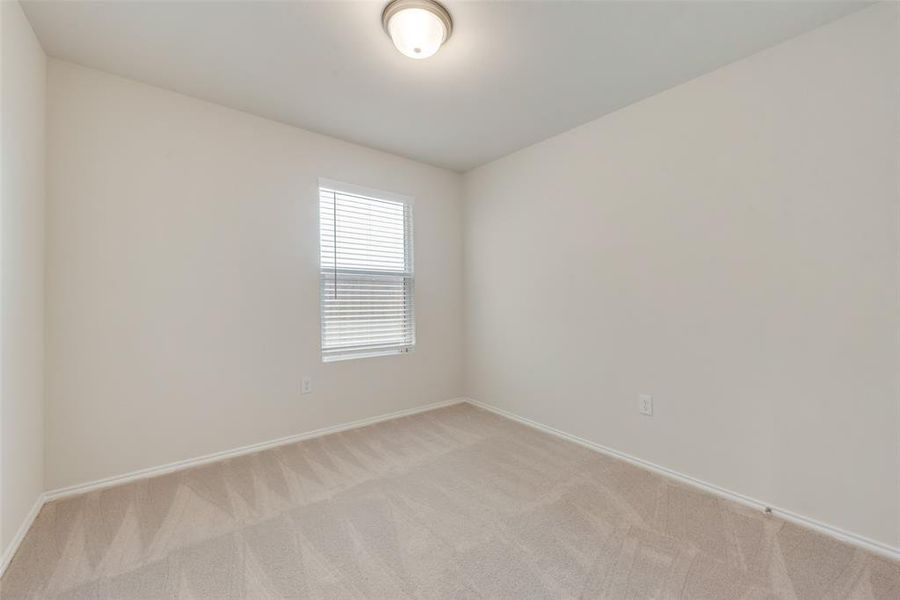 Bedroom featuring carpeted floors