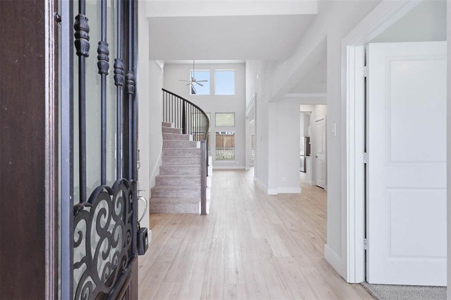 Bright interior entryway with neutral finishes and modern flooring.