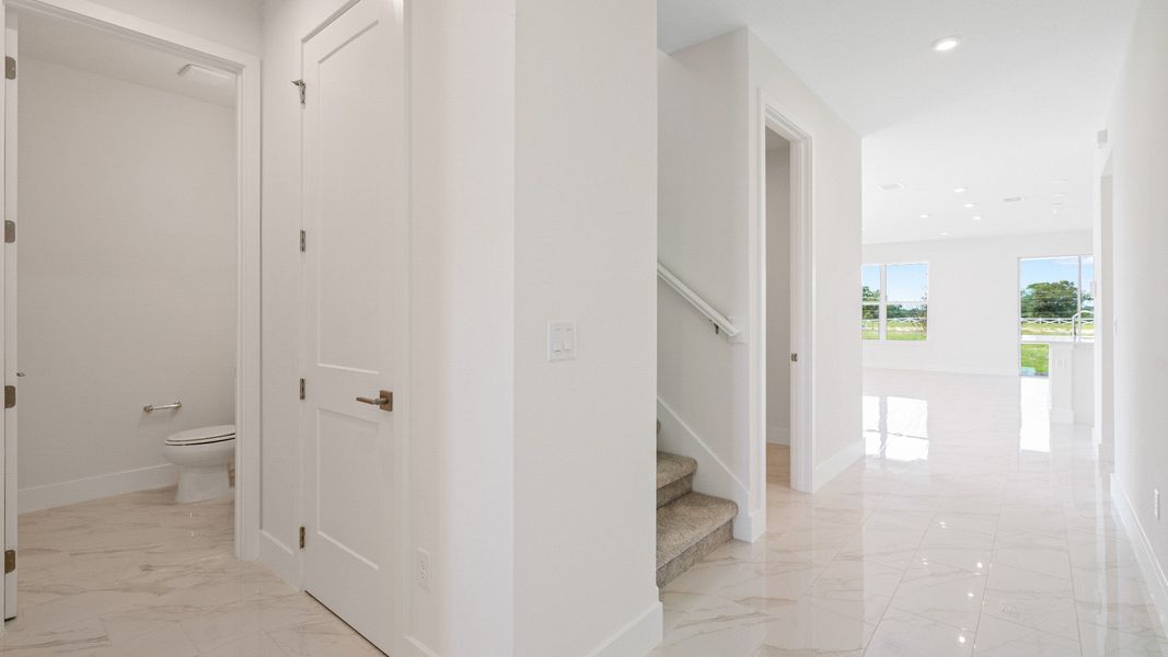 The Sweetgum guest bath two story home in Trailside in Mount Dora by DRB Homes