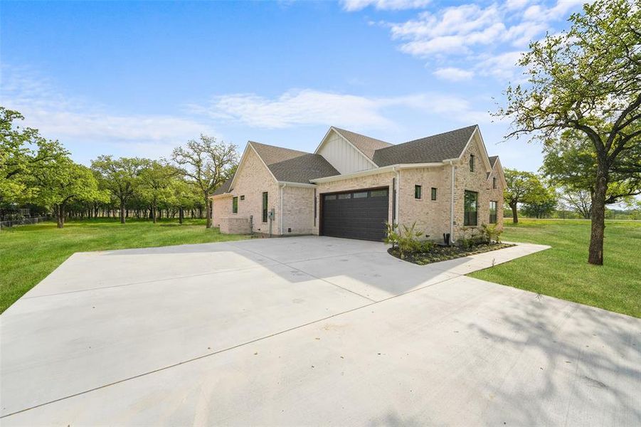 Front exterior of a new home in , Weatherford, TX, highlighting curb appeal (Image 2). Front exterior of a new home in , Weatherford, TX, highlighting curb appeal (Image 2).