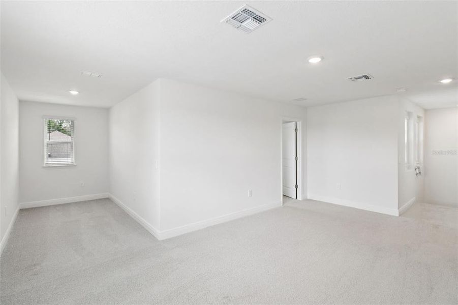 Spacious, unfurnished interior of a new home in The Reserve at Hammock Oaks - Classic Series, Lady Lake (Image 33). Spacious, unfurnished interior of a new home in The Reserve at Hammock Oaks - Classic Series, Lady Lake (Image 33).