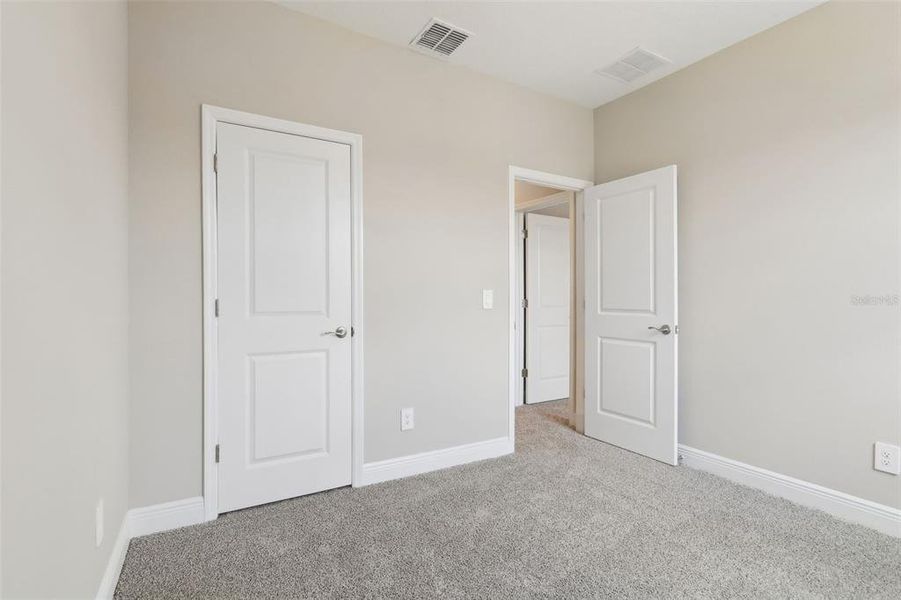 Spacious, unfurnished interior of a new home in Silverleaf Reserve Bungalows, Winter Garden (Image 24).