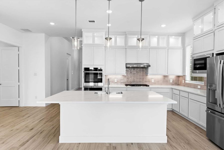 Furnished interior view inside a new home in Wood Leaf Reserve, Tomball (Image 8).