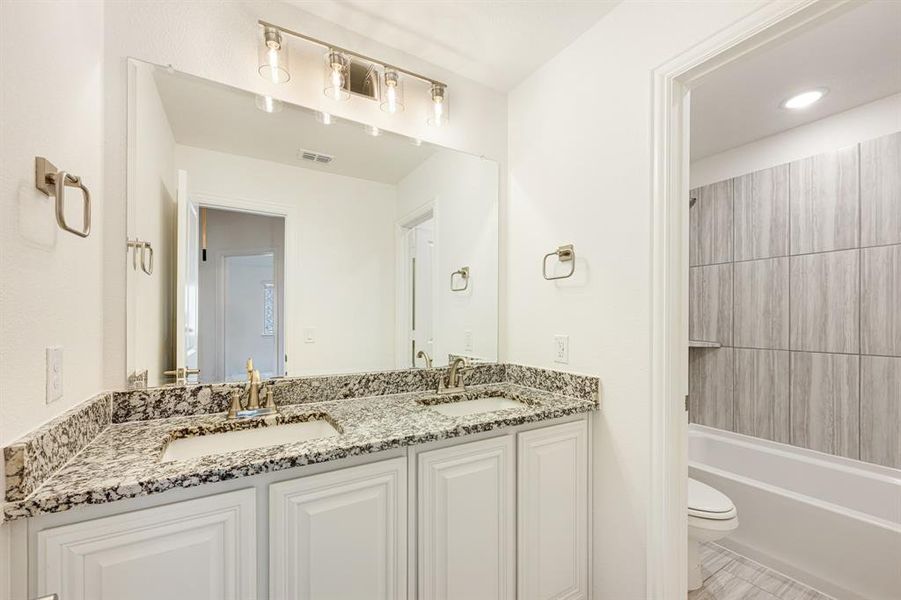 Furnished interior view inside a new home in Union Park Classic 55, Little Elm (Image 12).