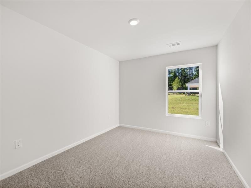 Spacious, unfurnished interior of a new home in Waypoint, Flowery Branch (Image 30).