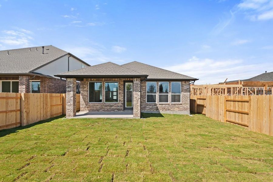 Exterior details and patio area of a home in Flora, Hutto (Image 21).