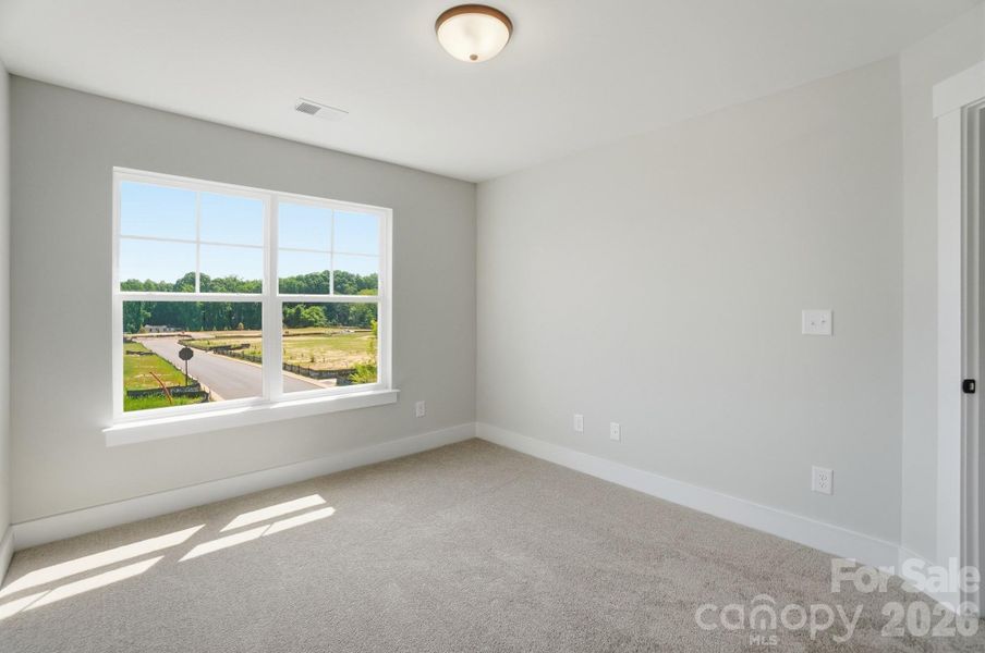 Spacious, unfurnished interior of a new home in Blythe Mill Townhomes, Waxhaw (Image 35).