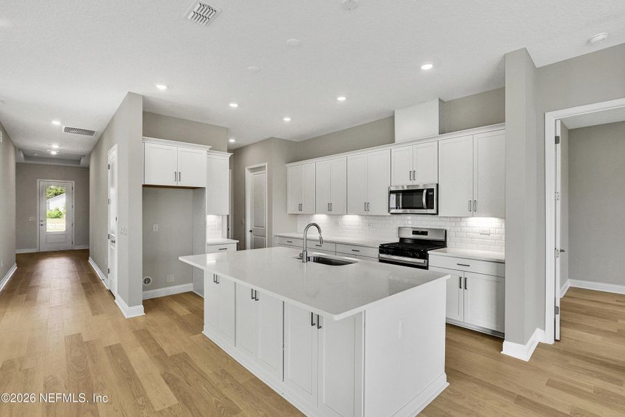 Furnished interior view inside a new home in Hyland Trail, Green Cove Springs (Image 5).