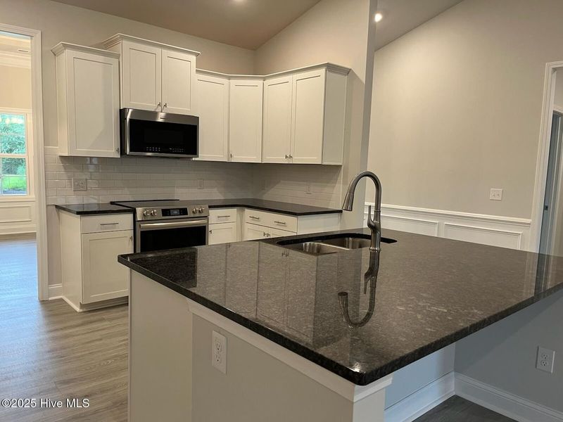 Furnished interior view inside a new home in Palmetto Creek, Bolivia (Image 4).