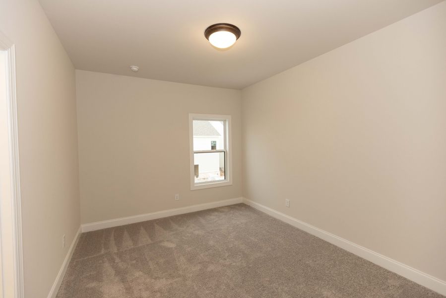 Representative unfurnished interior of a home built from the The Tensley by The Providence Group in Waterhaven, Cumming (Image 33).