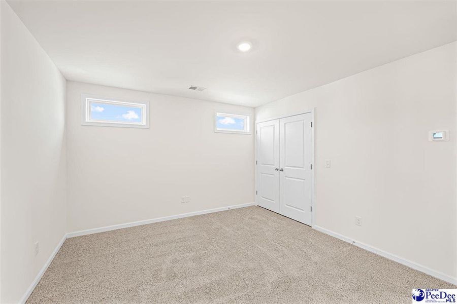 Spacious, unfurnished interior of a new home in The Grove, Florence (Image 12).