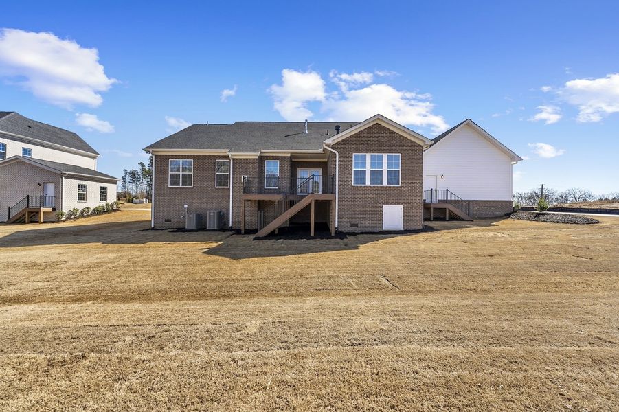 Exterior details and patio area of a home in Walnut Grove, Easley (Image 25).
