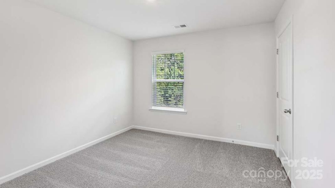 Spacious, unfurnished interior of a new home in Wallace Springs, Statesville (Image 17).