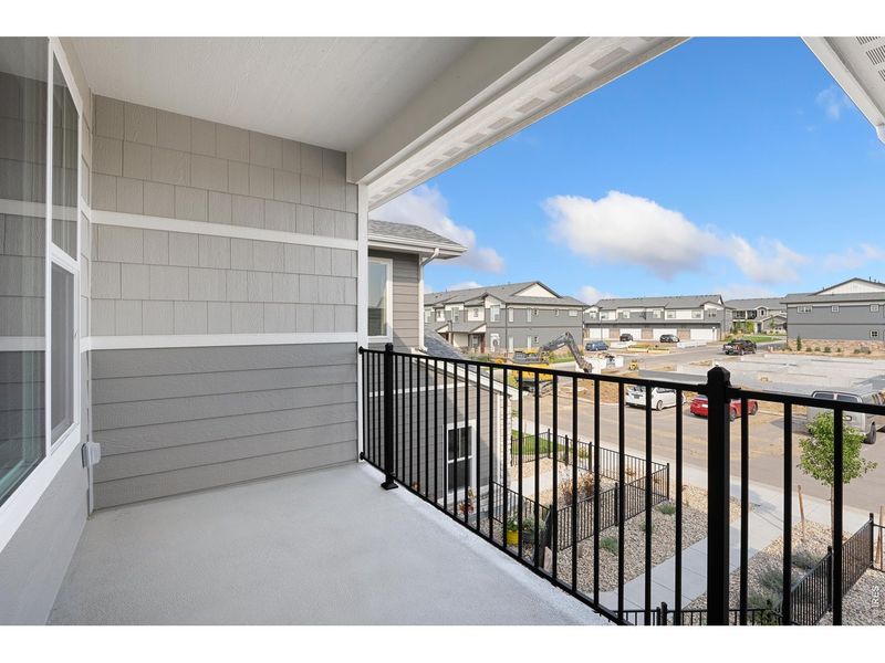 Exterior details and patio area of a home in The Lakes at Centerra - Discovery, Loveland (Image 4).