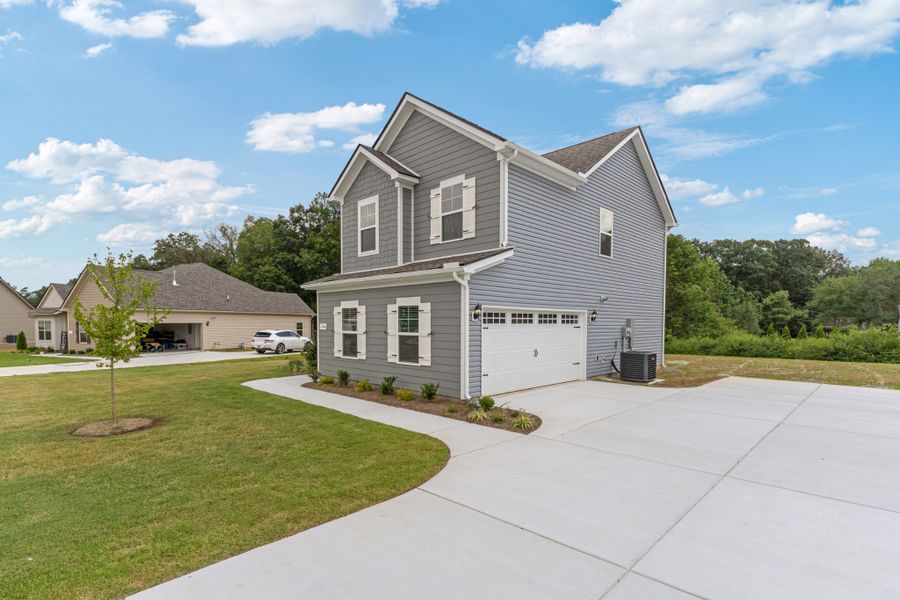 Front exterior of a new home in Stillwater, Tullahoma, TN, highlighting curb appeal (Image 2).
